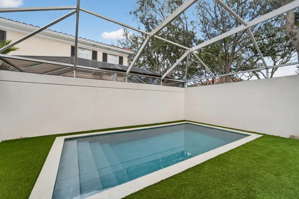 a view of a backyard with a small cabin