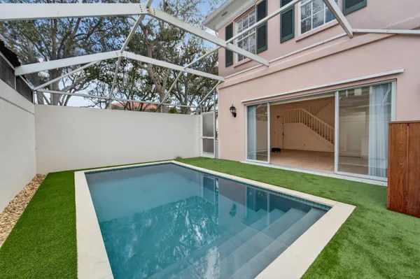 a view of swimming pool with a yard