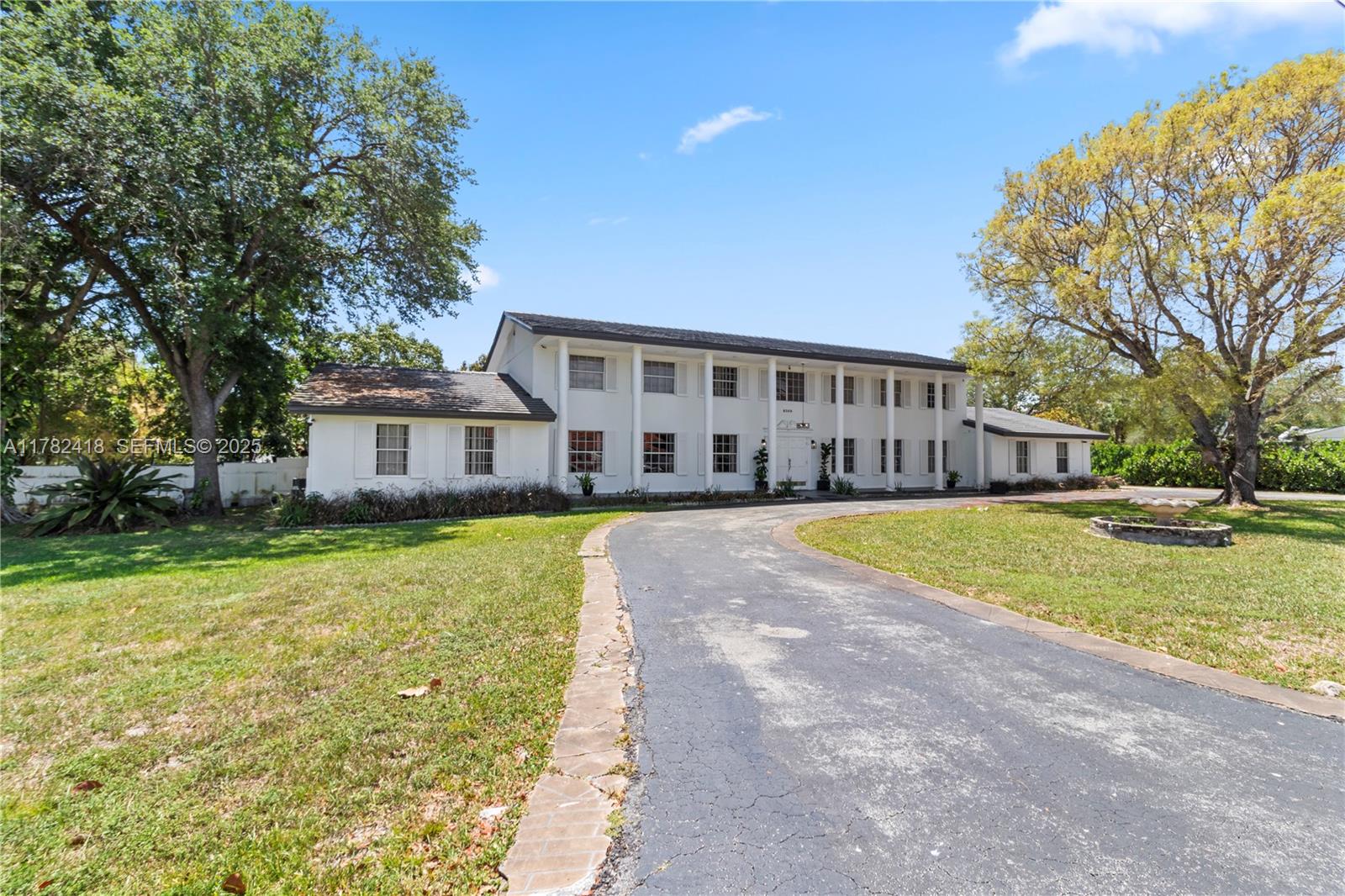 8350 Southwest 98th Street Miami, FL 33156 - Photo 1 of 67 a view of a house with a swimming pool