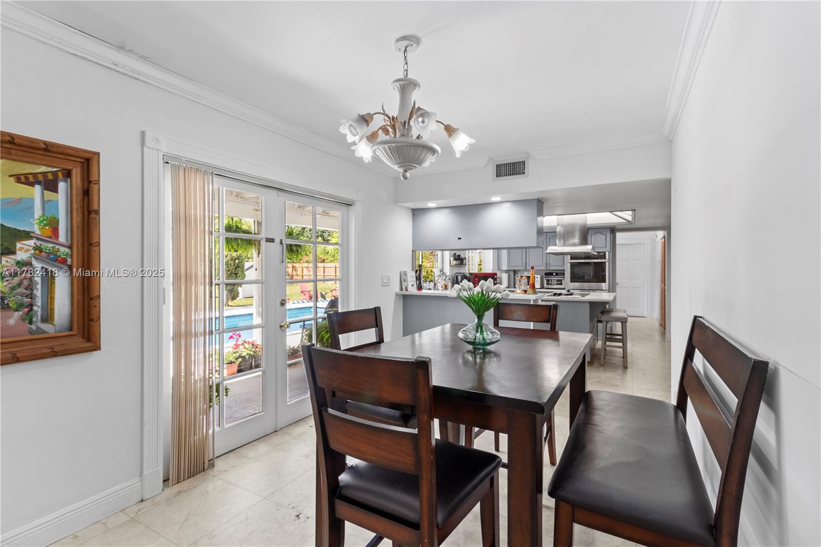 8350 Southwest 98th Street Miami, FL 33156 - Photo 11 of 67 a view of a dining room with furniture window and outside view