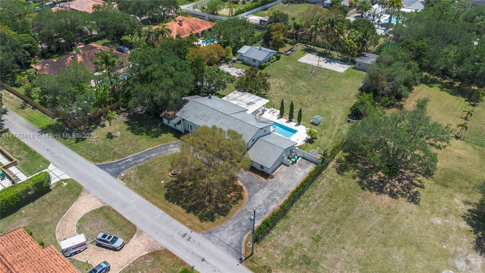 8350 Southwest 98th Street Miami, FL 33156 - Photo 3 of 67 an aerial view of a house