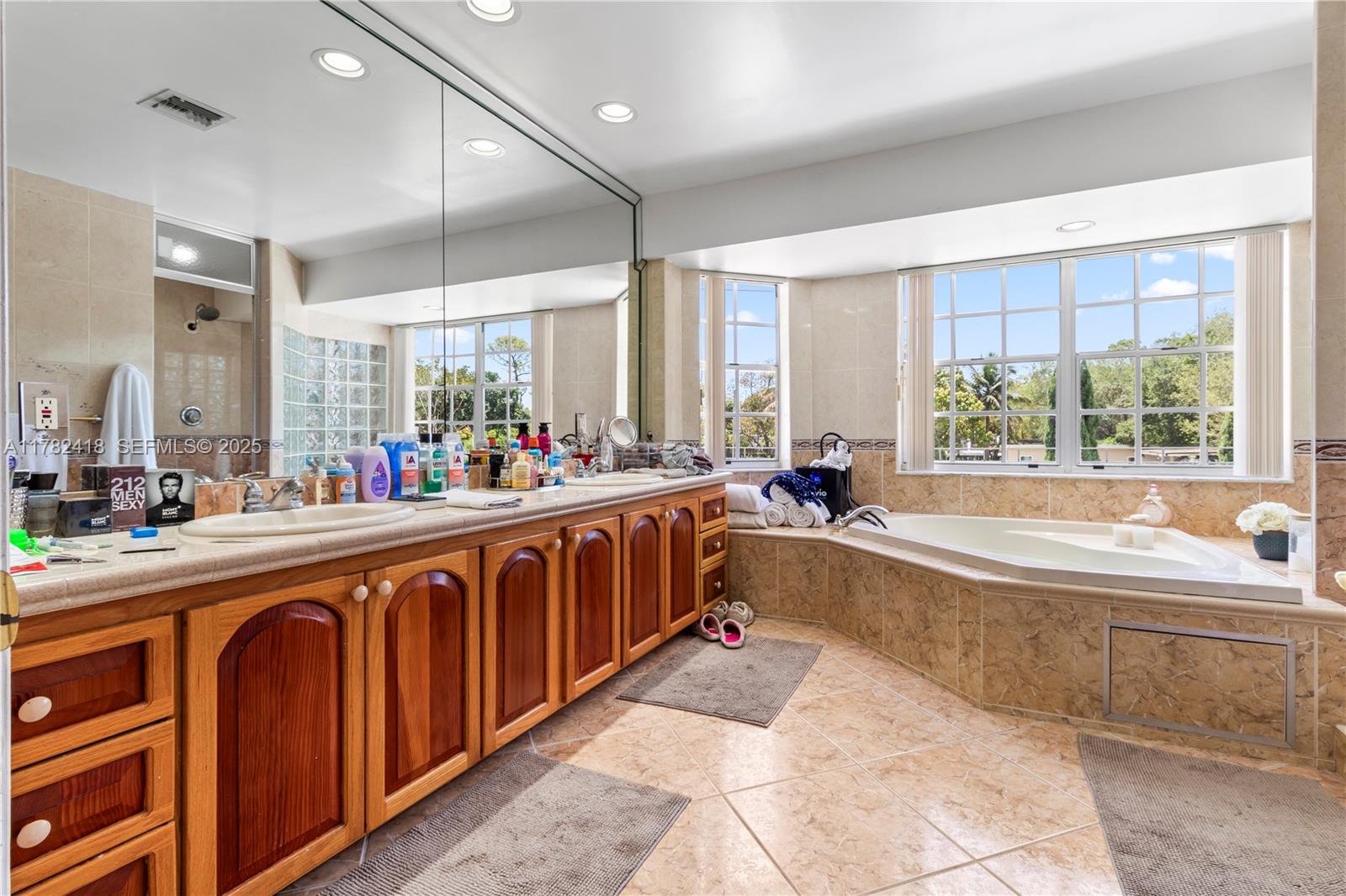 8350 Southwest 98th Street Miami, FL 33156 - Photo 34 of 67 a large spacious bathroom with a large tub and sink