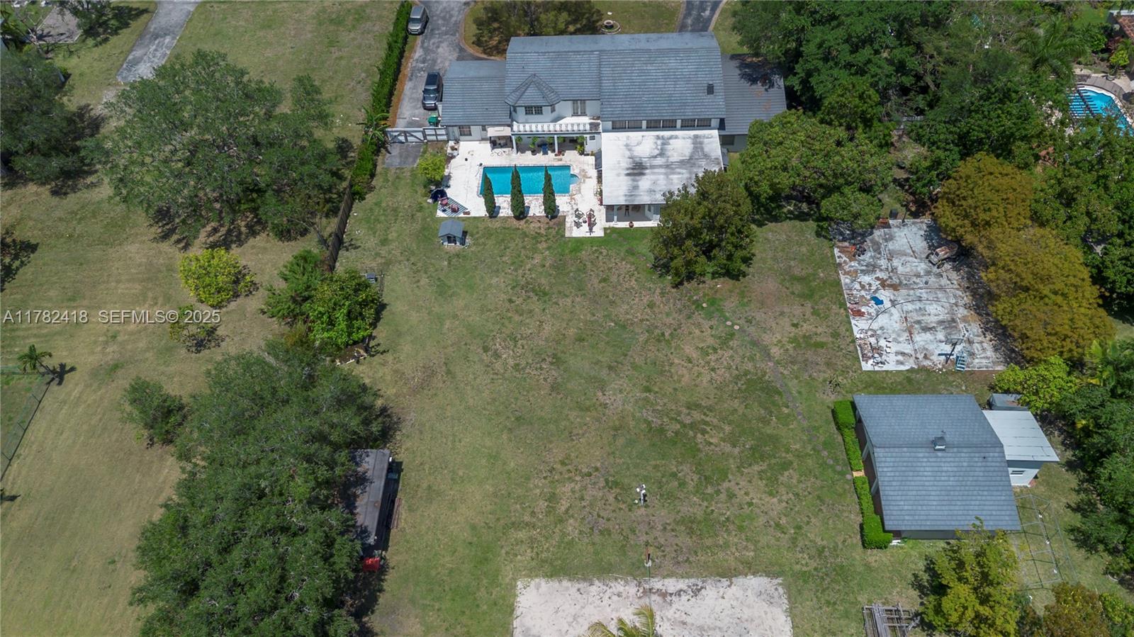 8350 Southwest 98th Street Miami, FL 33156 - Photo 4 of 67 an aerial view of residential house with outdoor space