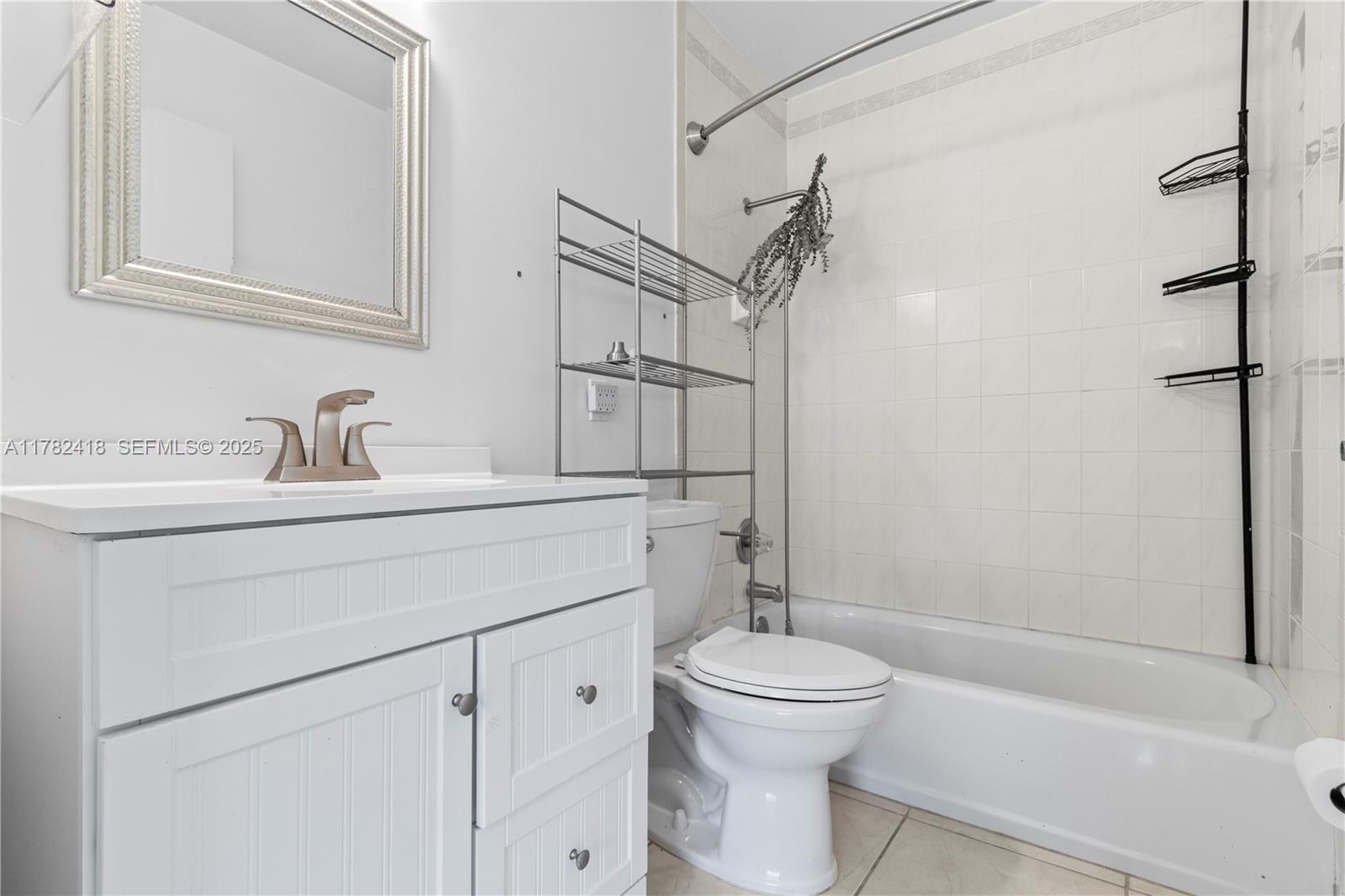 8350 Southwest 98th Street Miami, FL 33156 - Photo 46 of 67 a bathroom with a sink a toilet and shower