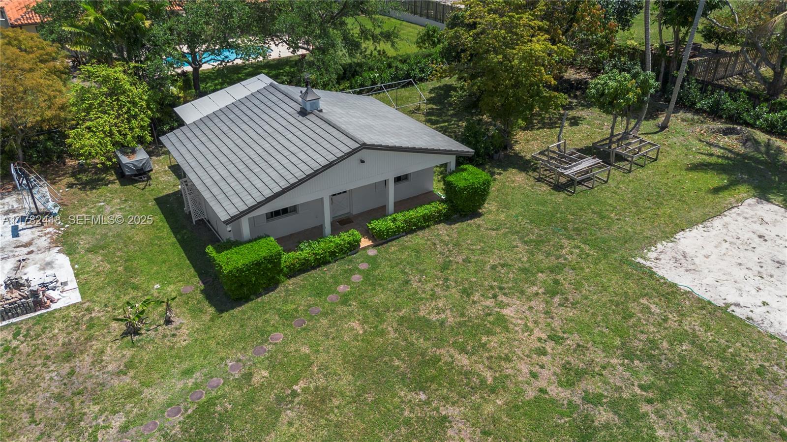 8350 Southwest 98th Street Miami, FL 33156 - Photo 58 of 67 a view of a house with a yard