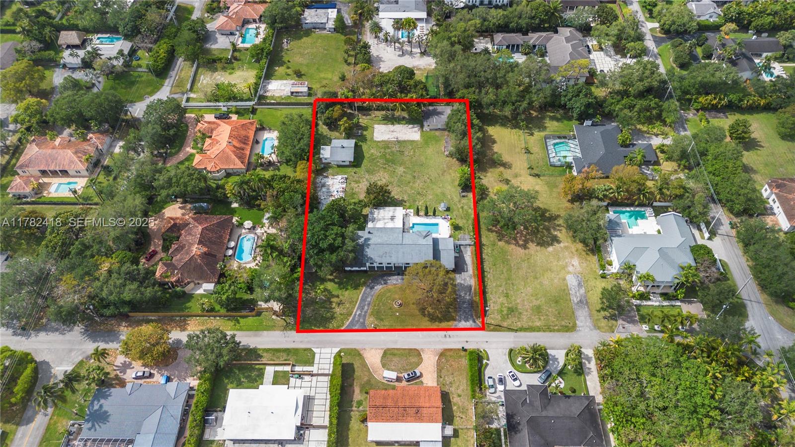 8350 Southwest 98th Street Miami, FL 33156 - Photo 62 of 67 an aerial view of residential houses with outdoor space and swimming pool