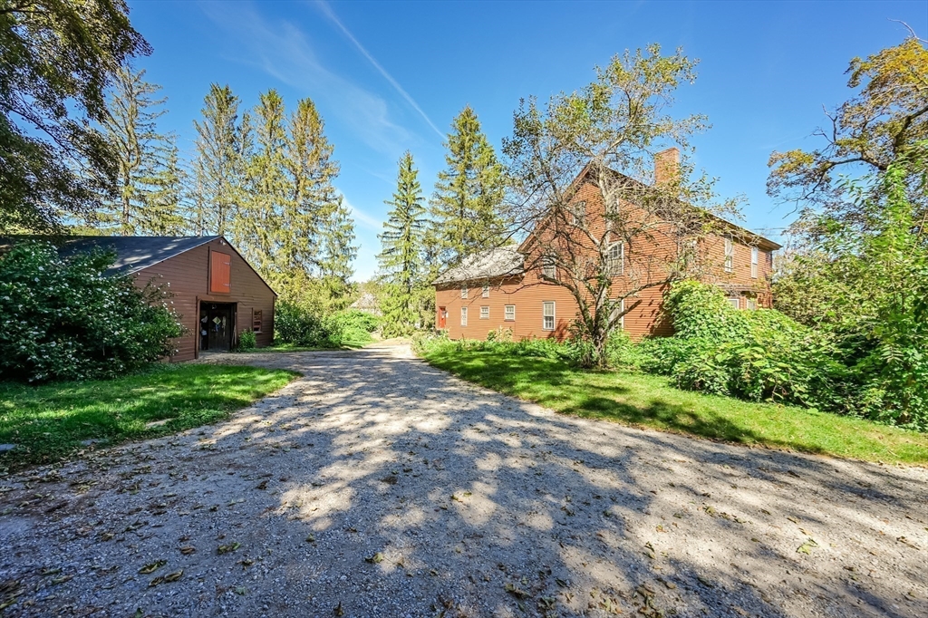 147 Shirley Street Pepperell, MA 01463 - Photo 12 of 42 a view of a house with a yard