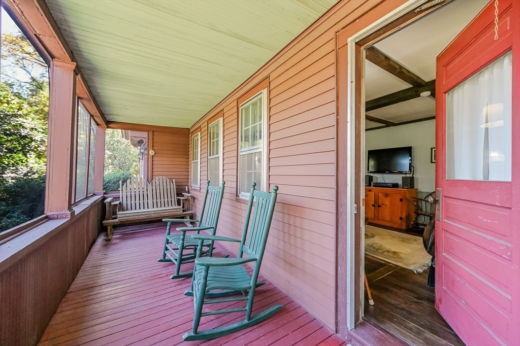 147 Shirley Street Pepperell, MA 01463 - Photo 24 of 42 a view of chair in the balcony