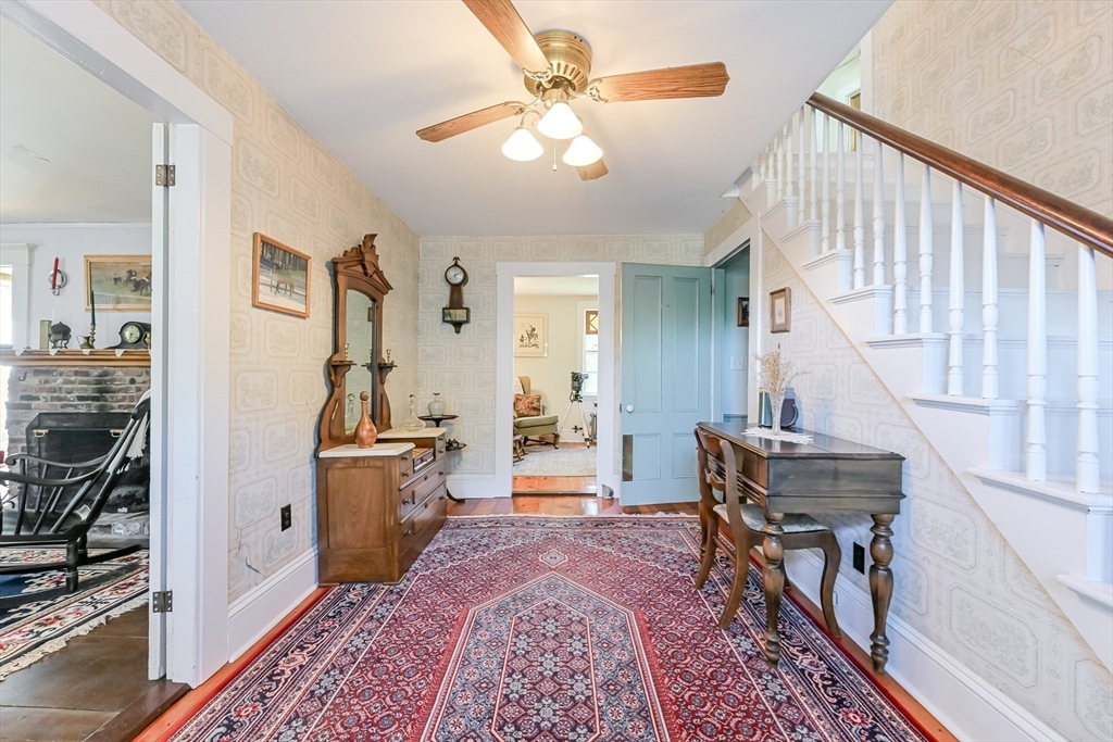 147 Shirley Street Pepperell, MA 01463 - Photo 25 of 42 a living room with furniture and a wooden floor