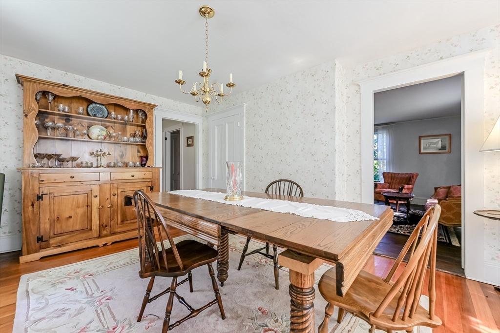 147 Shirley Street Pepperell, MA 01463 - Photo 28 of 42 a view of a dining room with furniture window and wooden floor