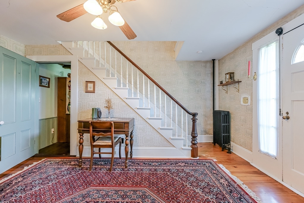 147 Shirley Street Pepperell, MA 01463 - Photo 30 of 42 a view of entryway and hall with a rug