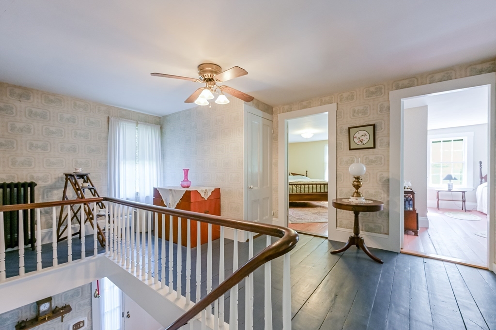 147 Shirley Street Pepperell, MA 01463 - Photo 31 of 42 a view of a livingroom with furniture and hardwood floor