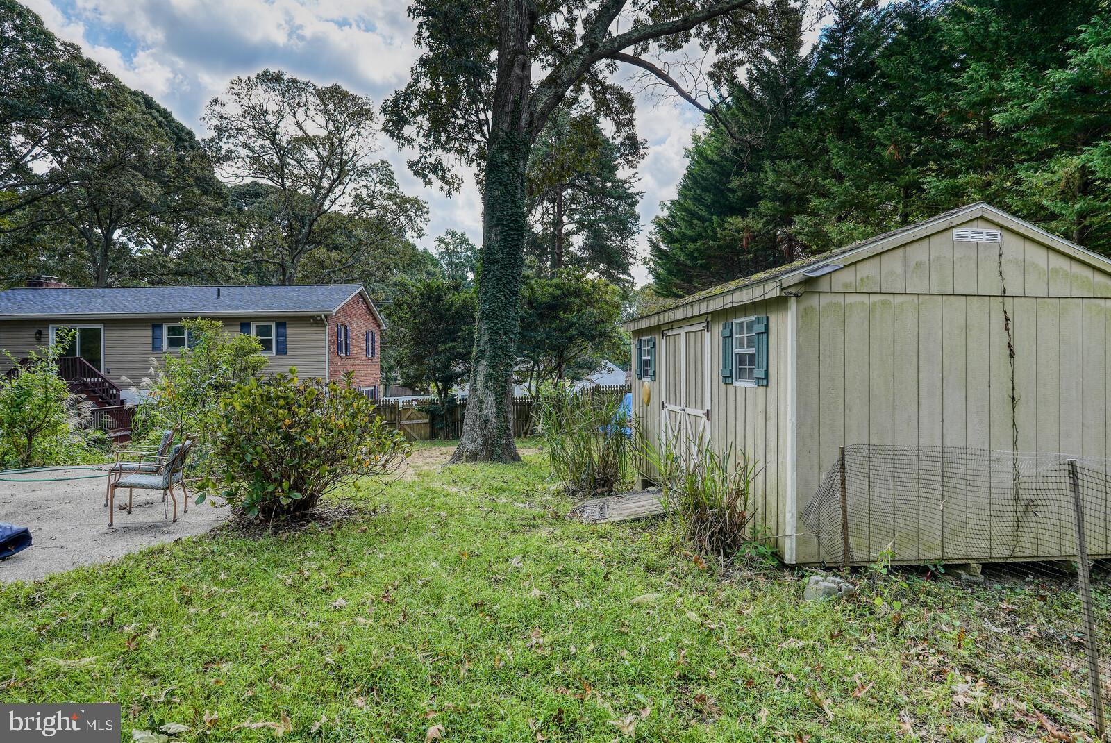 1142 Calvert Beach Road St. Leonard, MD 20685 - Photo 60 of 63 a view of a back yard