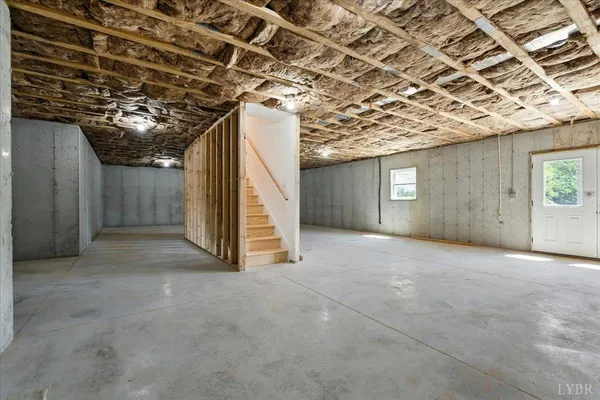 a view of a room with wooden walls