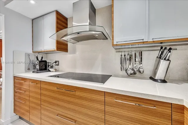 a kitchen with stainless steel appliances a refrigerator sink and cabinets