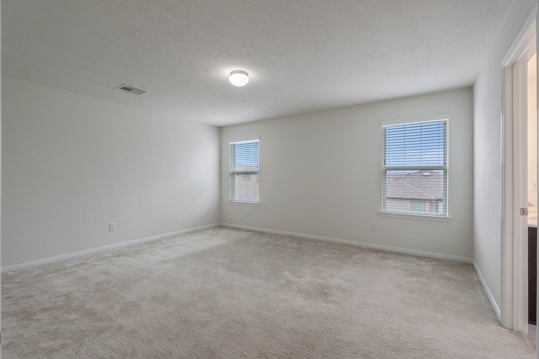 16623 Cliff Vale Court Houston, TX 77084 - Photo 16 of 34 a view of an empty room with a window