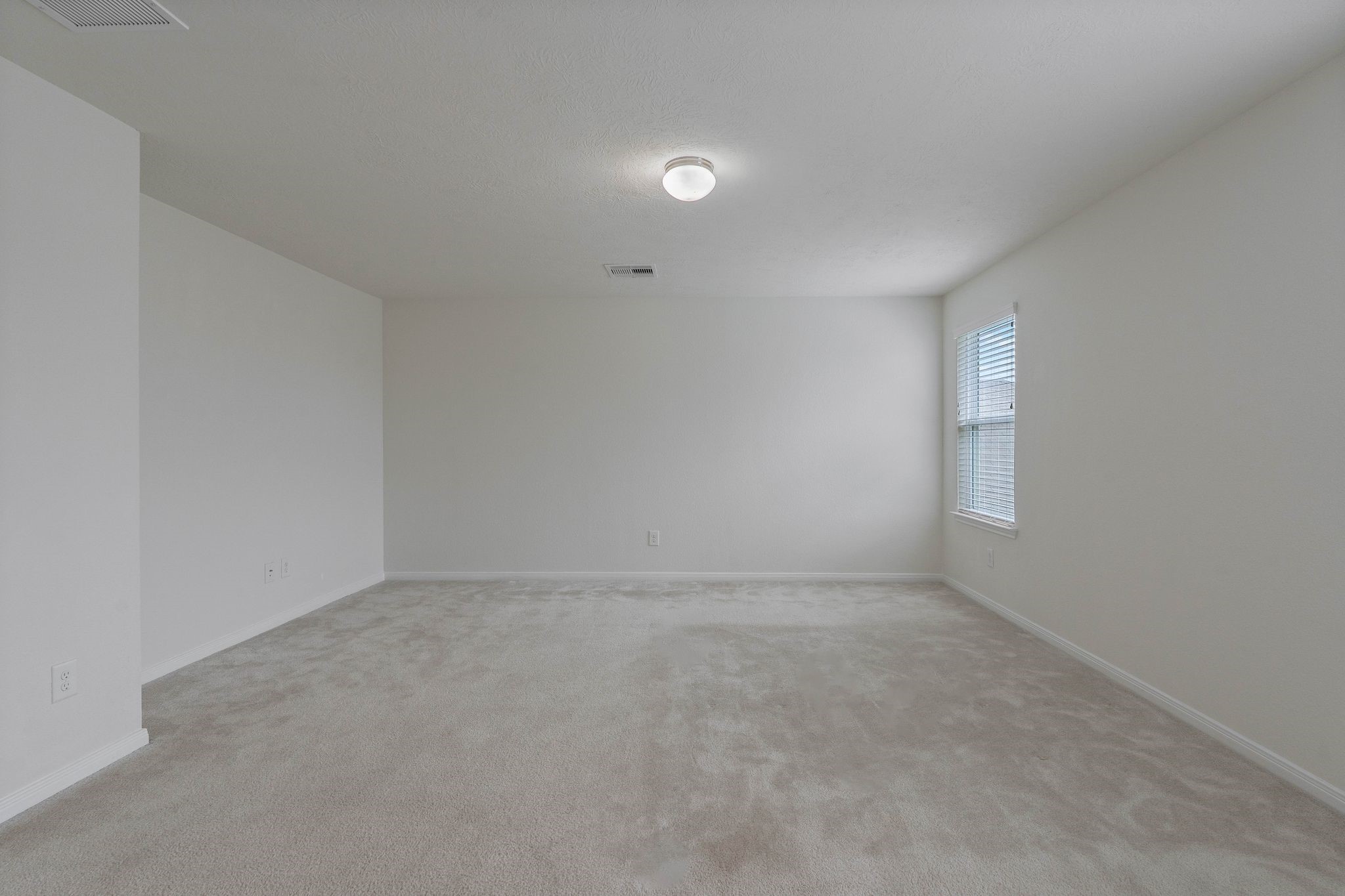 16623 Cliff Vale Court Houston, TX 77084 - Photo 17 of 34 an empty room with a empty space and window