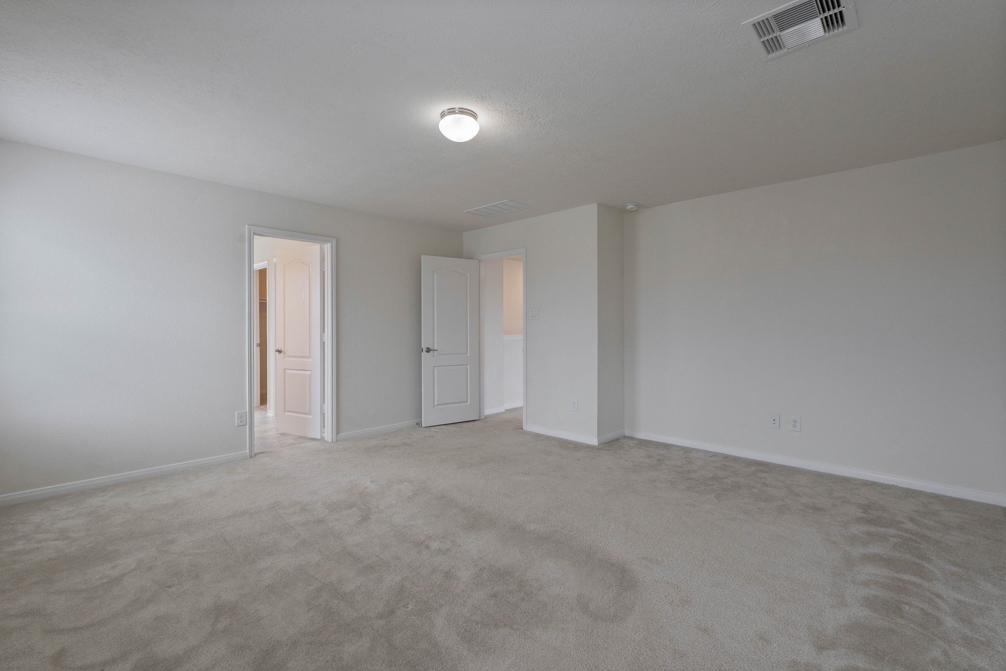 16623 Cliff Vale Court Houston, TX 77084 - Photo 18 of 34 a view of an empty room and a bathroom