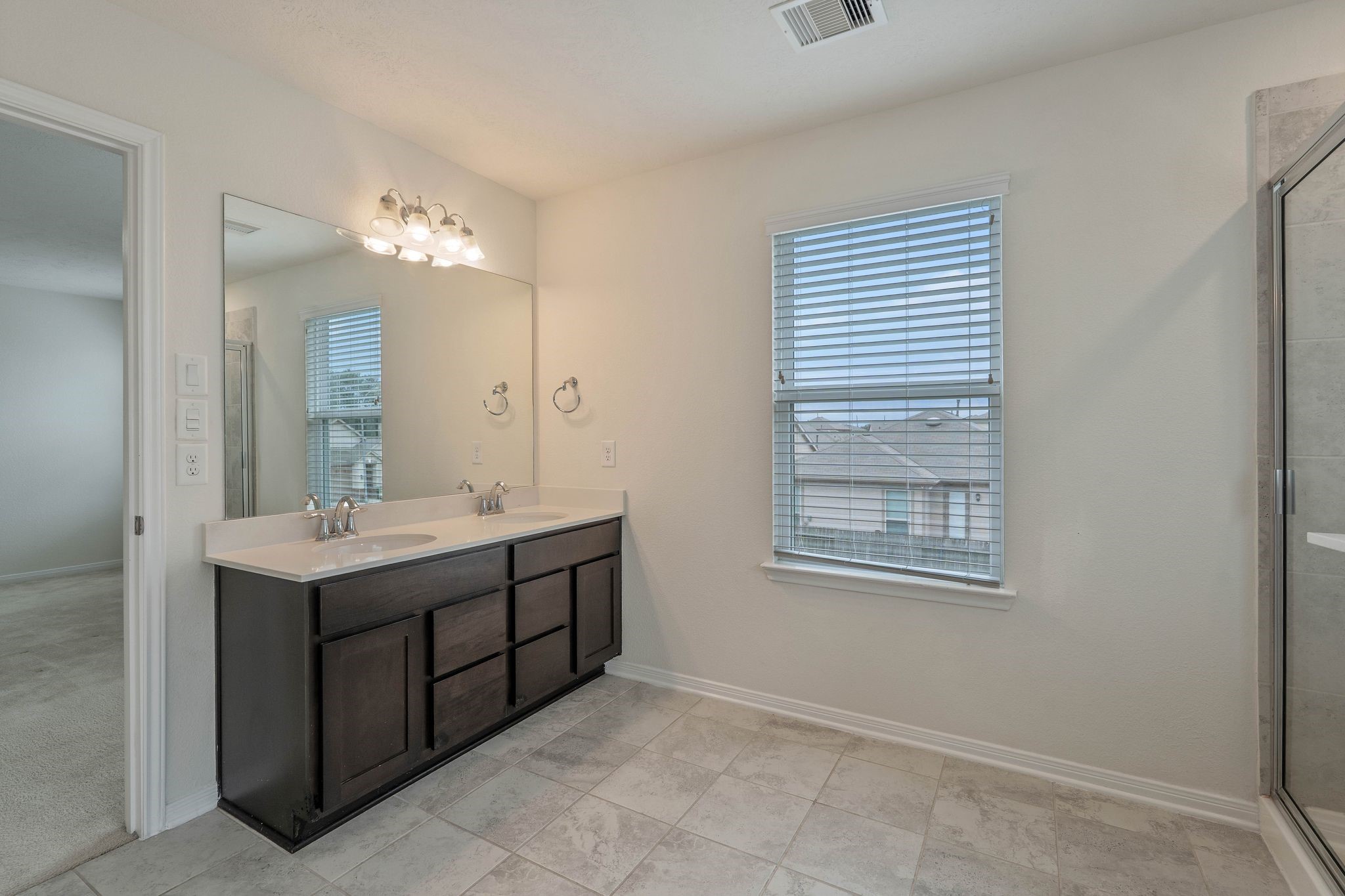 16623 Cliff Vale Court Houston, TX 77084 - Photo 20 of 34 a bathroom with a sink and a mirror