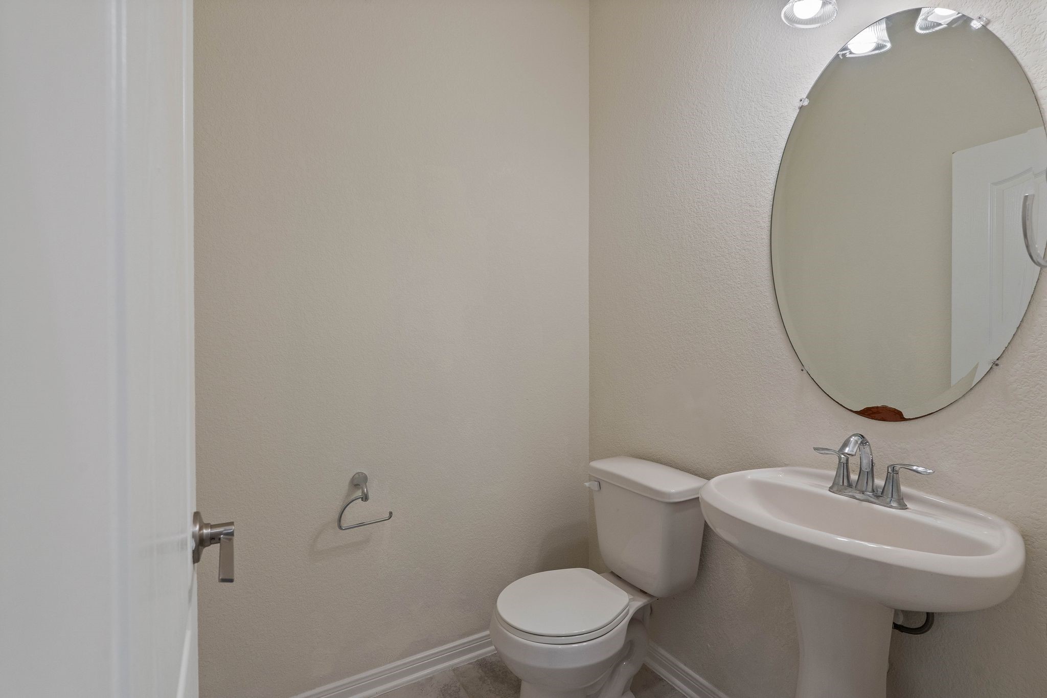 16623 Cliff Vale Court Houston, TX 77084 - Photo 26 of 34 a bathroom with a sink toilet and a mirror