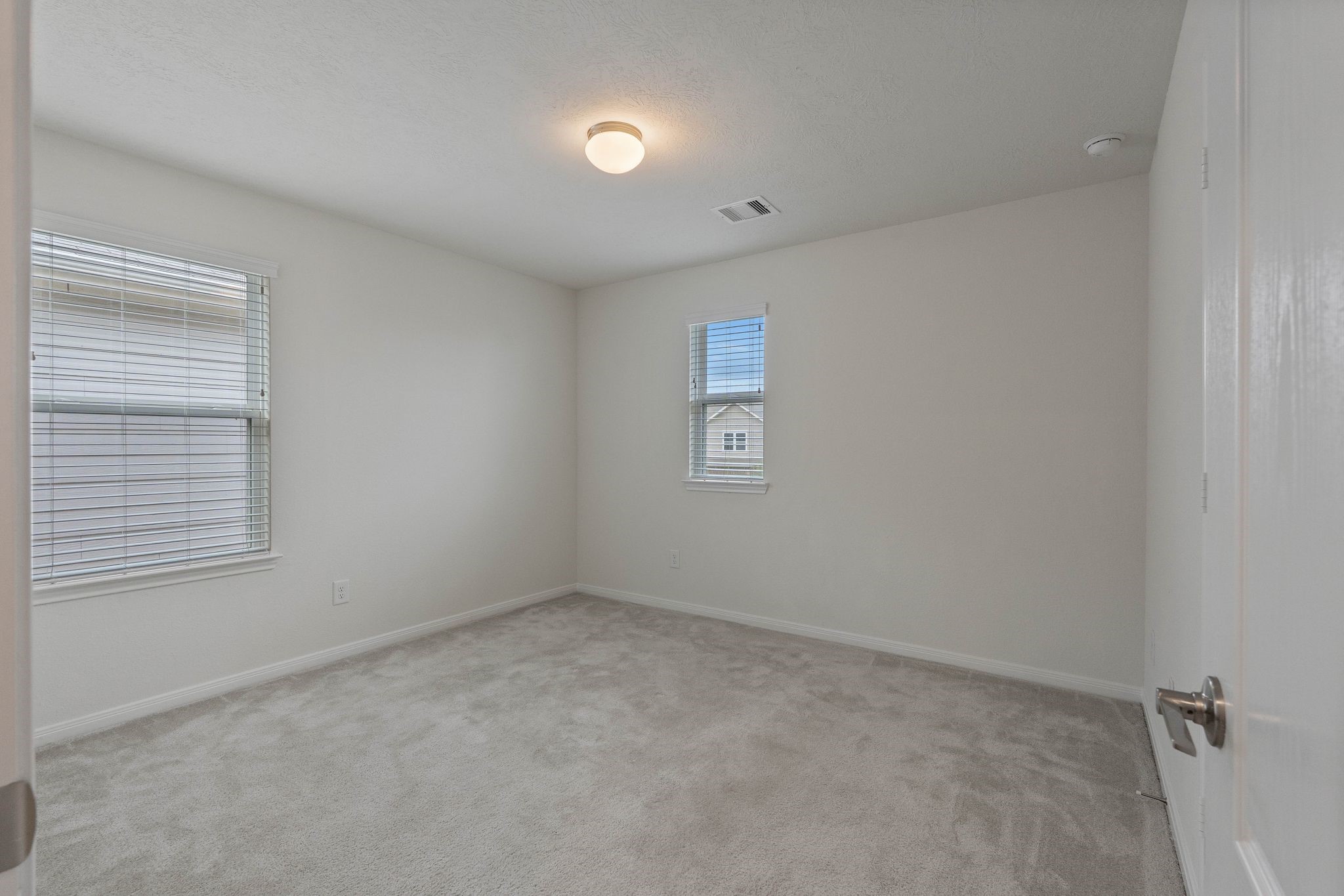 16623 Cliff Vale Court Houston, TX 77084 - Photo 27 of 34 an empty room with a window
