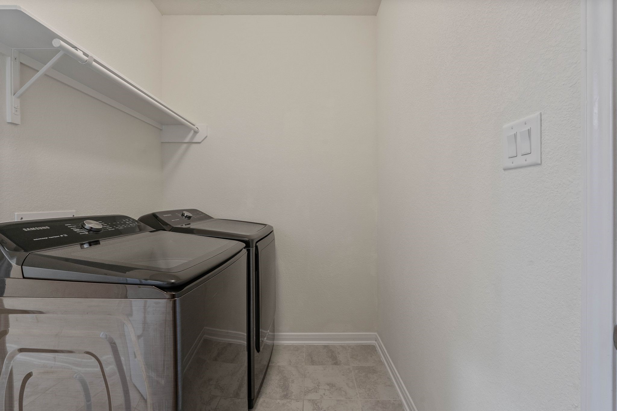 16623 Cliff Vale Court Houston, TX 77084 - Photo 30 of 34 a utility room with dryer and washer