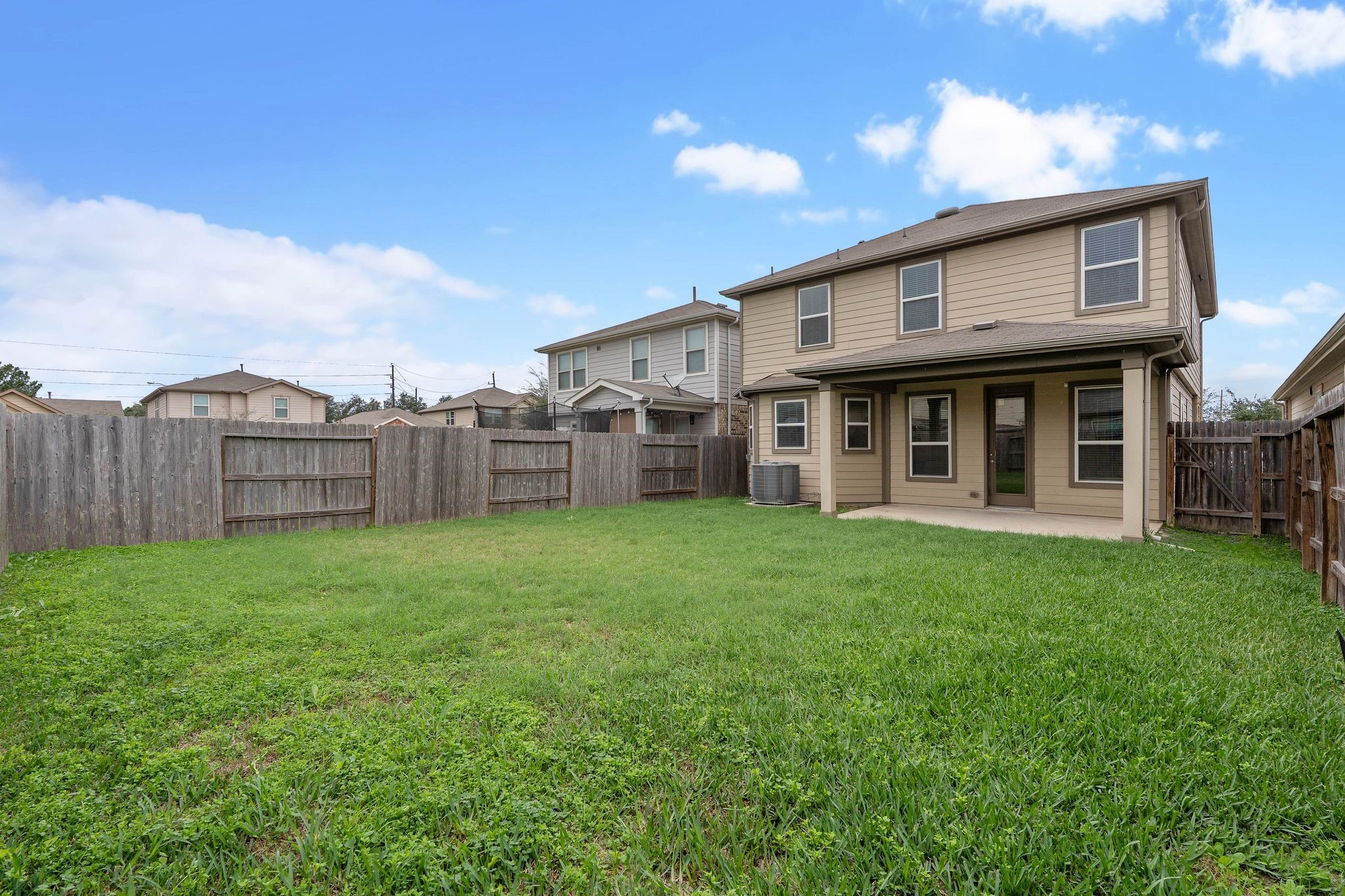 16623 Cliff Vale Court Houston, TX 77084 - Photo 33 of 34 a view of a house with backyard and porch