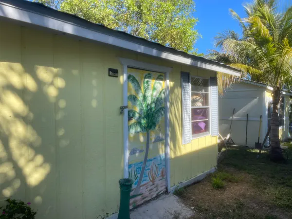 a front view of a house with yard