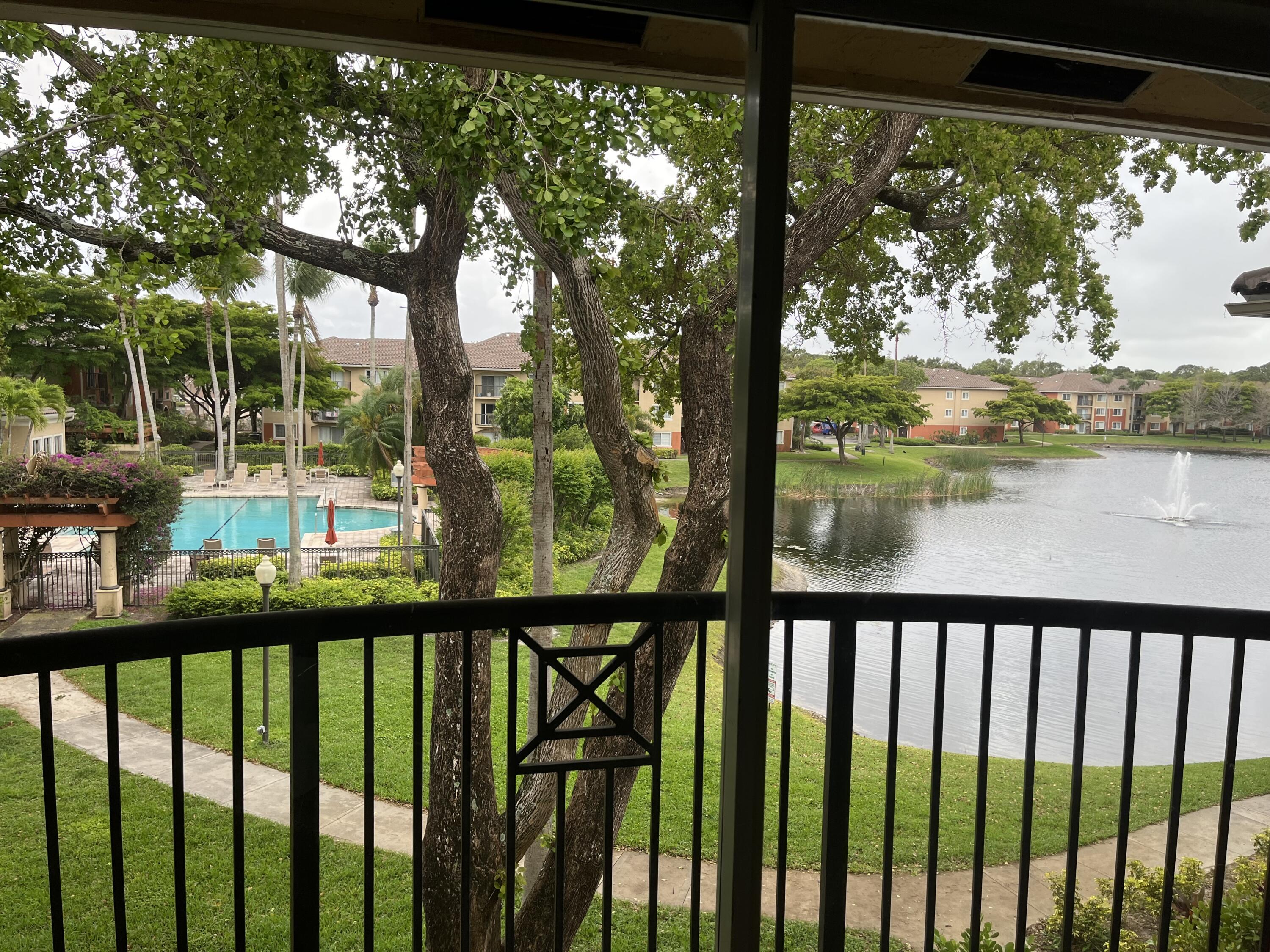 4191 Haverhill Road, Unit 409 West Palm Beach, FL 33417 - Photo 7 of 17 a city view from a balcony