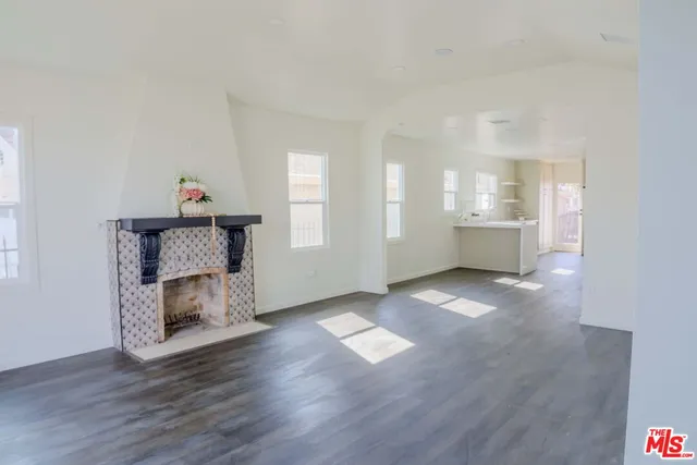 a view of workspace with wooden floor and window