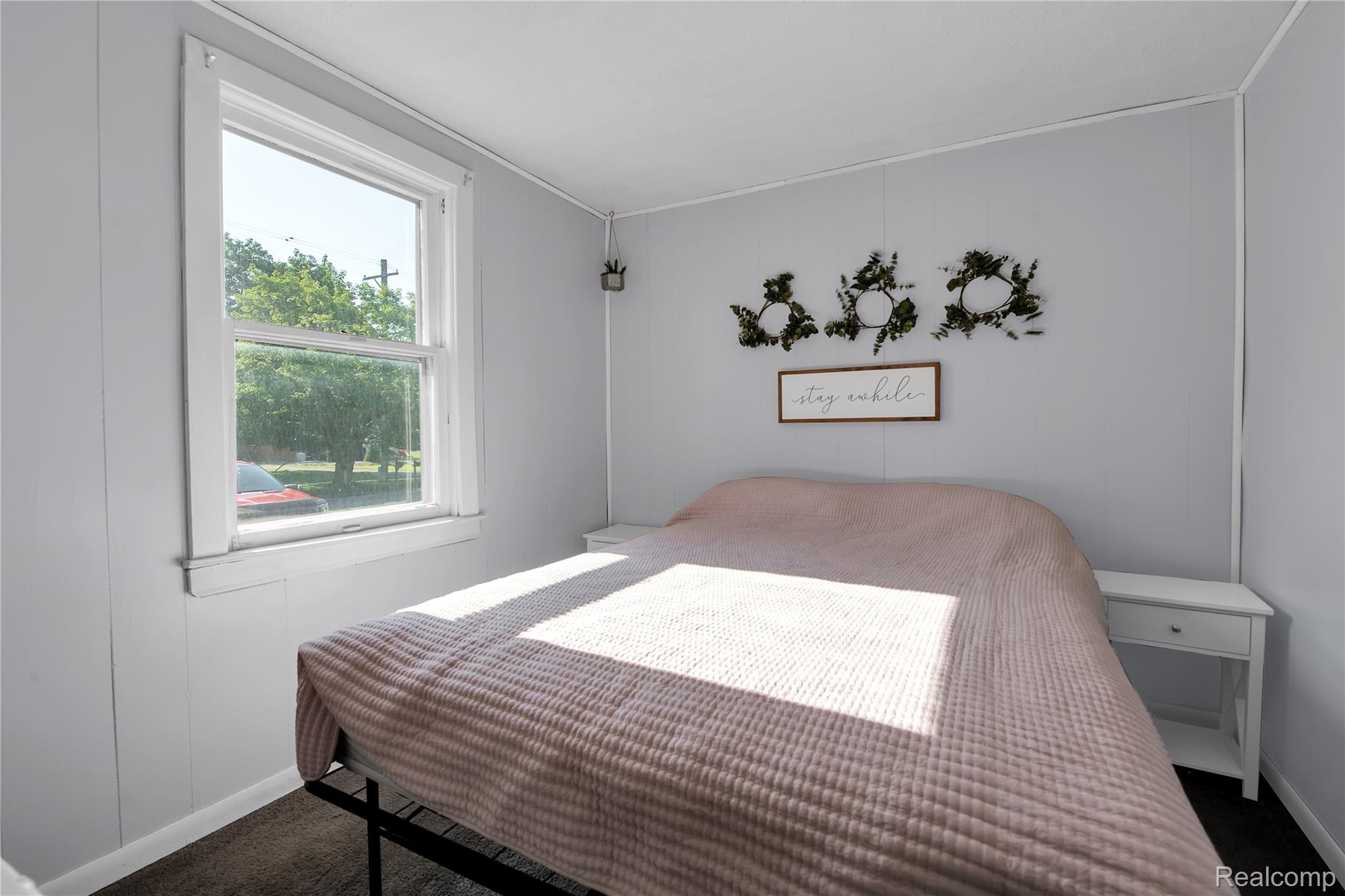 58925 Haven Ridge Road New Haven, MI 48048 - Photo 10 of 22 Bedroom featuring baseboards and dark carpet