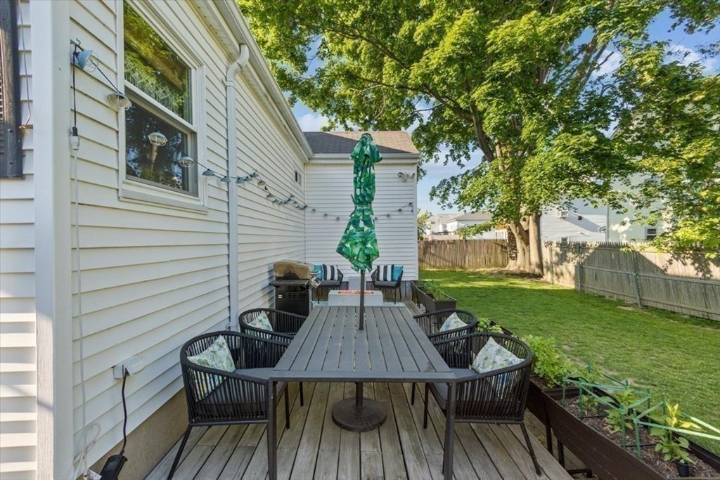 68 Congress Street Fall River, MA 02721 - Photo 28 of 38 a view of a deck with chairs and a large tree