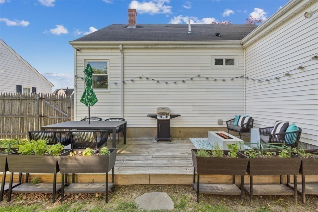 68 Congress Street Fall River, MA 02721 - Photo 29 of 38 a view of a chairs and table in a patio