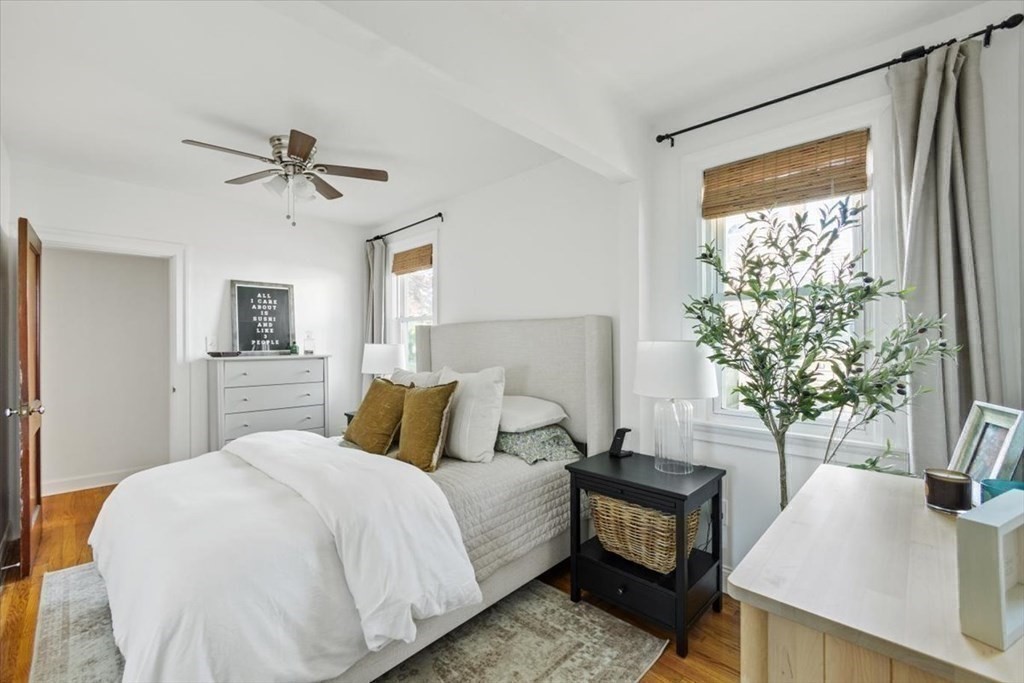 68 Congress Street Fall River, MA 02721 - Photo 5 of 38 a bedroom with a bed and a potted plant