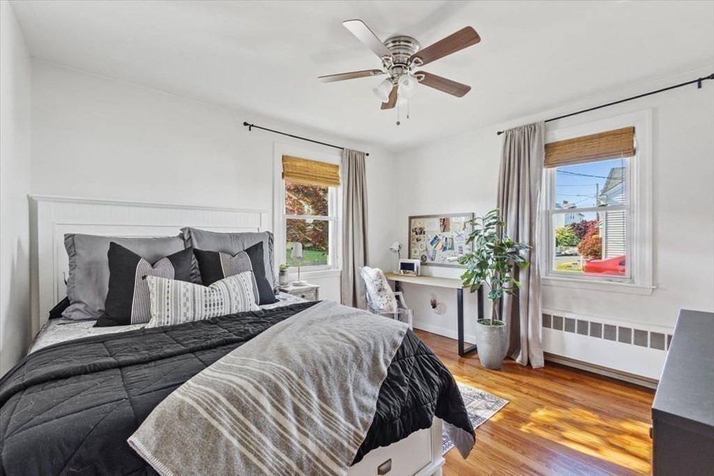 68 Congress Street Fall River, MA 02721 - Photo 6 of 38 a bedroom with a bed a couch and dresser