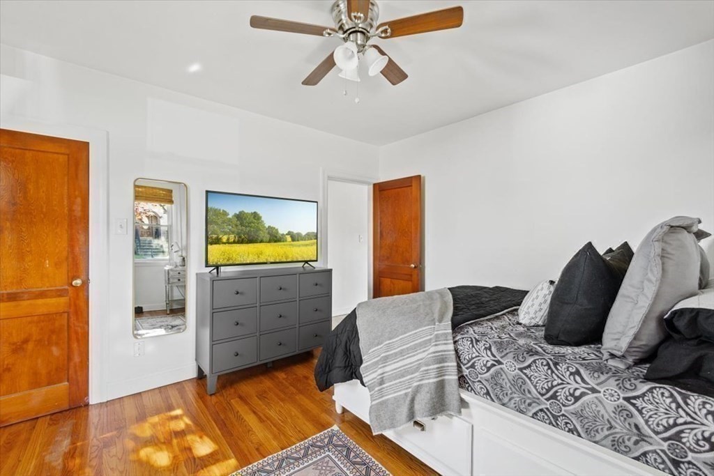 68 Congress Street Fall River, MA 02721 - Photo 8 of 38 a living room with furniture and a flat screen tv