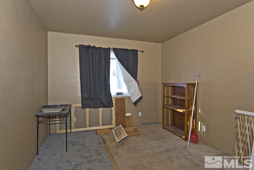 166 Pleasant Valley Road Markleeville, CA 96120 - Photo 17 of 24 a view of a room with gym equipment
