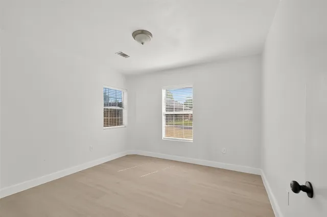 an empty room with a window