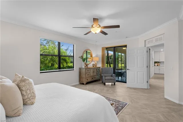 a bedroom with a bed furniture and a window