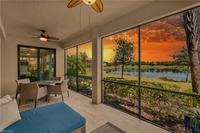 a living room with hardwood floor and furniture