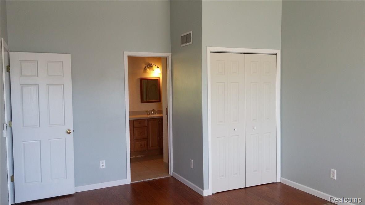 825 3rd Street Fenton, MI 48430 - Photo 13 of 26 2nd Closet in the Master Bedroom & A private Master Bathroom.