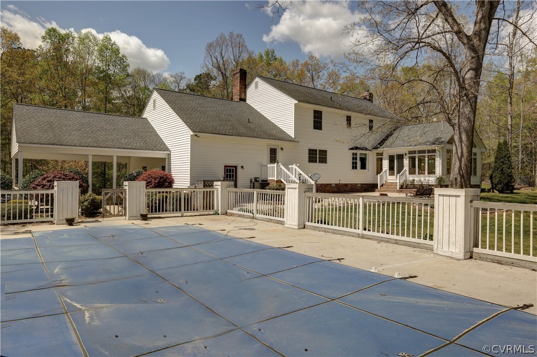 207 Rustic Drive Carson, VA 23830 - Photo 13 of 49 a view of a house with large trees and stairs