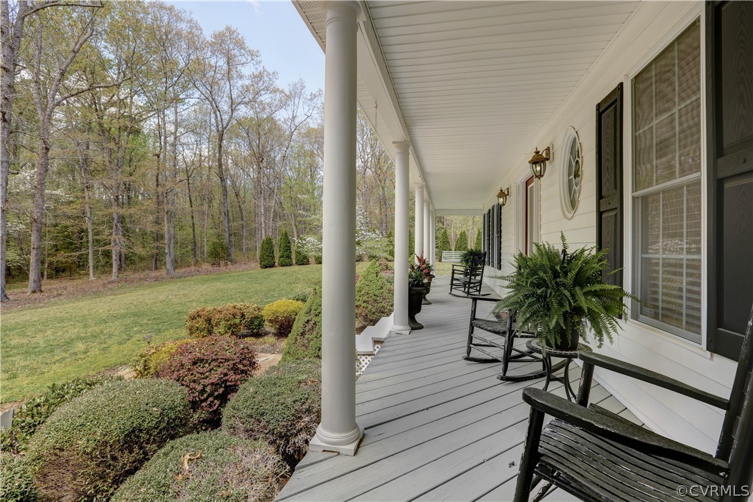 207 Rustic Drive Carson, VA 23830 - Photo 8 of 49 a view of a house with backyard and sitting area