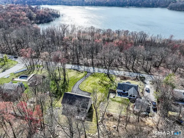 a view of yard along with trees