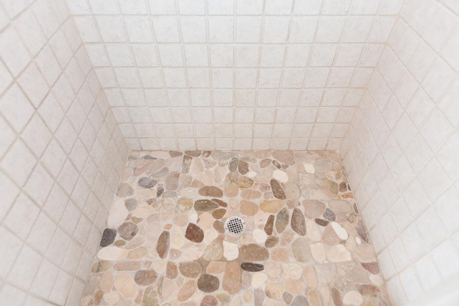 11 Cotuit Cove Road Cotuit, MA 02635 - Photo 17 of 35 a bathroom with a shower curtain