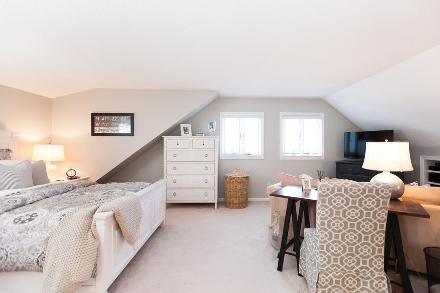 11 Cotuit Cove Road Cotuit, MA 02635 - Photo 20 of 35 a bed room with furniture and a window