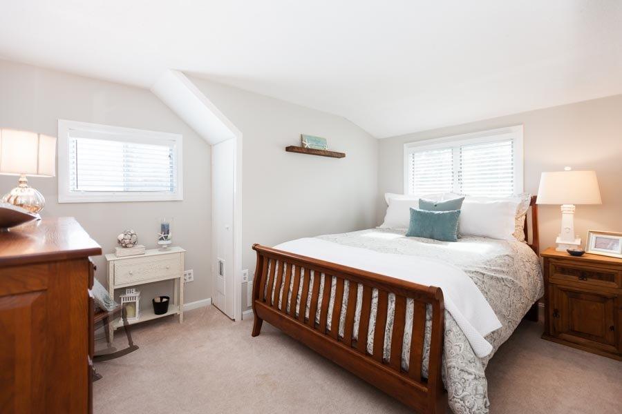 11 Cotuit Cove Road Cotuit, MA 02635 - Photo 25 of 35 a bedroom with a bed and a window