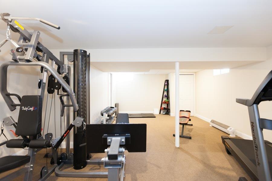 11 Cotuit Cove Road Cotuit, MA 02635 - Photo 26 of 35 a view of a workspace with furniture and a floor to ceiling window