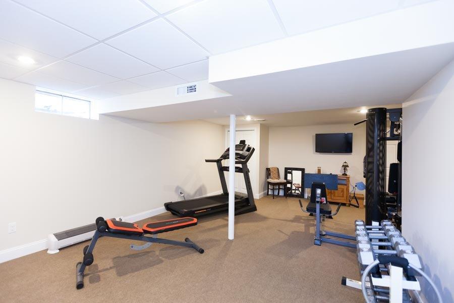 11 Cotuit Cove Road Cotuit, MA 02635 - Photo 27 of 35 a view of a room with gym equipment