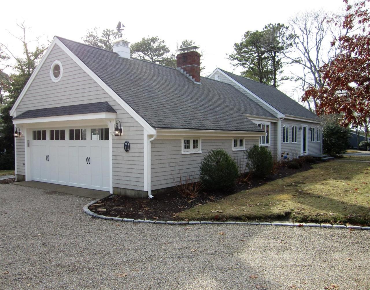 11 Cotuit Cove Road Cotuit, MA 02635 - Photo 3 of 35 a view of a house with a yard